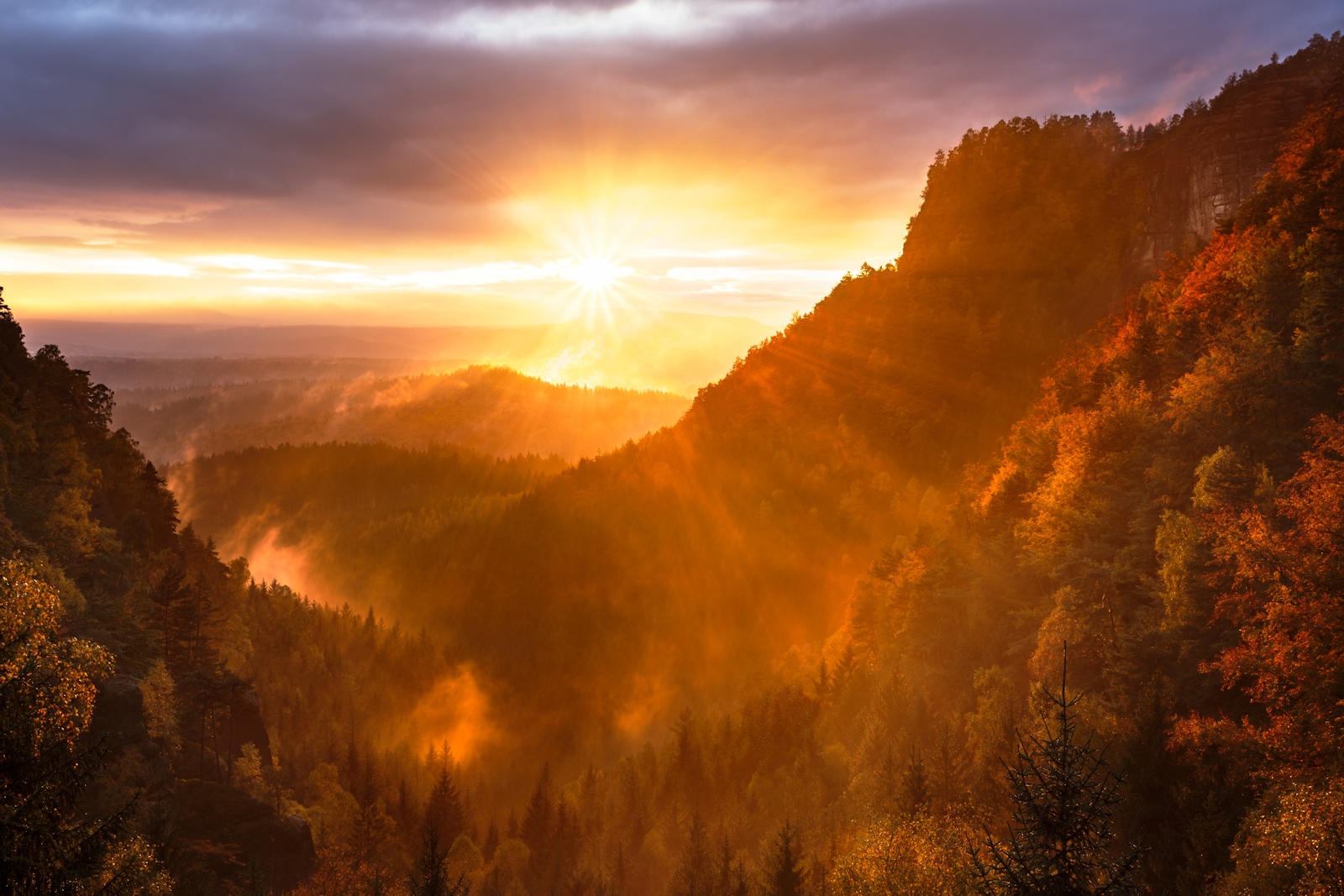 Sunrise over a mountain Photo Credit Artem Sapegin